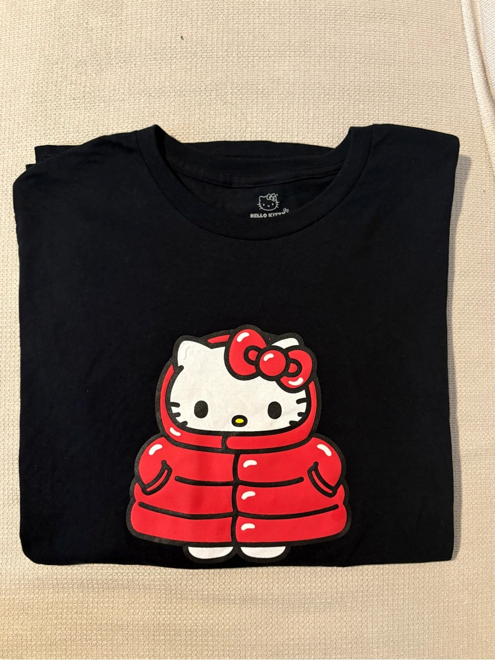 Hello Kitty Black Tee with Red Puffer Graphic - Kids
